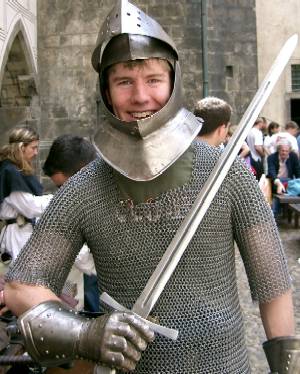 Ryan Mitchell doning medieval armour at Prague Castle on Scouting exchange